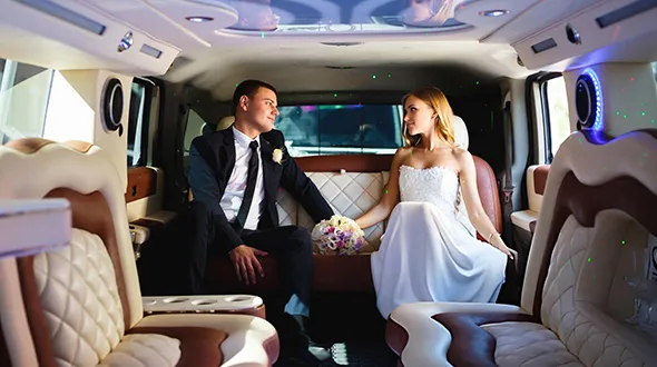 Wedding limo rentals in Lithonia GA including Chrysler 300 and Cadillac Escalade limousines for an elegant wedding day experience.